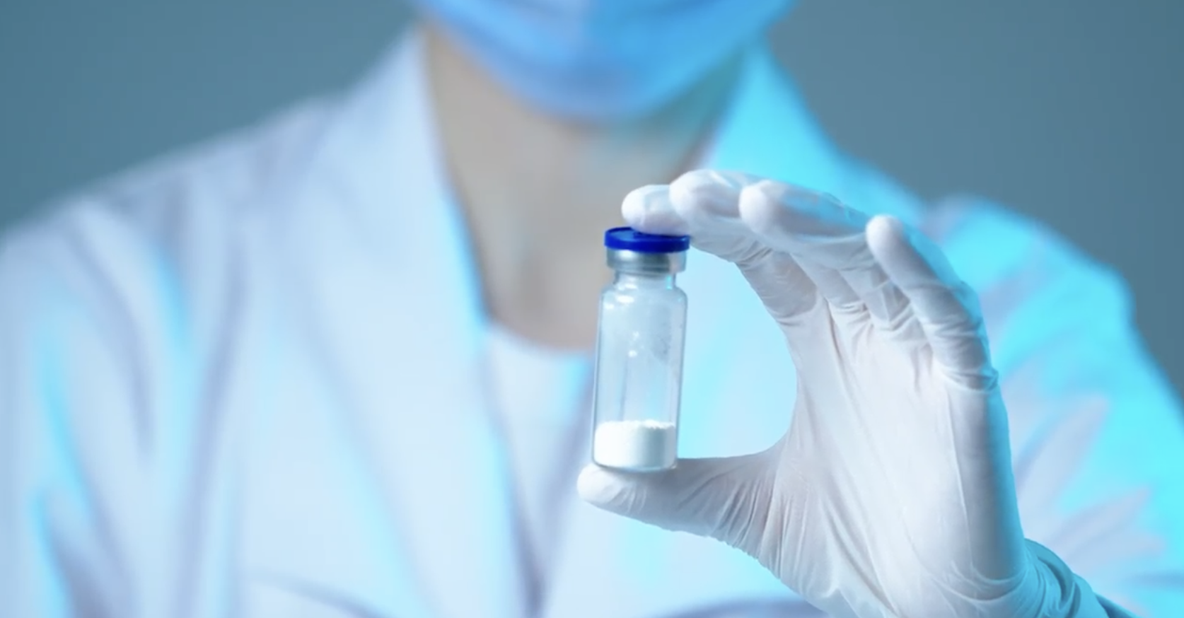 Lyophilization: Person holding lyophilized powder in a vial